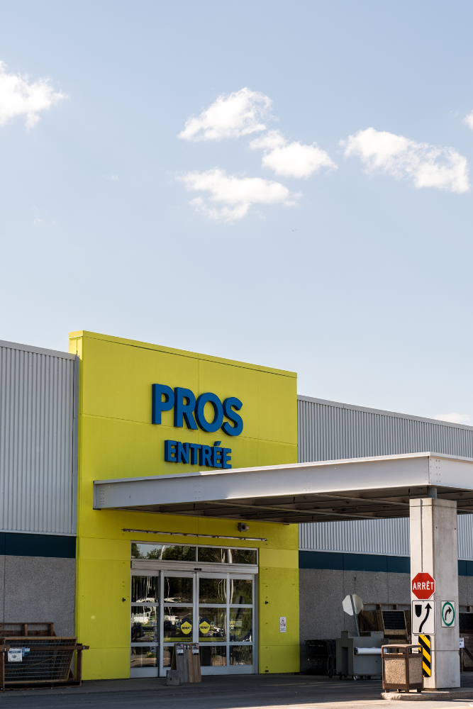 Photo de jour vue de face enseigne Pros Entrée